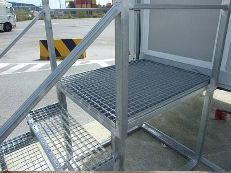 This is galvanized welded bar grating stairs to the container in height.