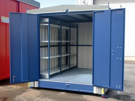 A container with galvanized steel grating floor and blue doors.