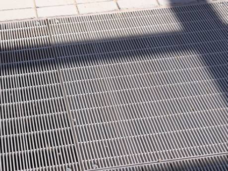 Dense steel grating as floors fir people to walk.