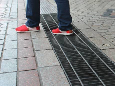 Drainage steel grating used in the street.