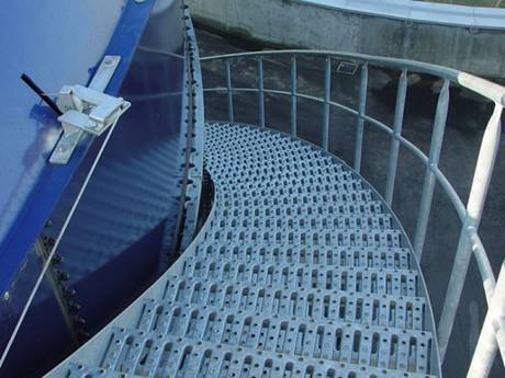 A interlocking safety grating is used as stair treads.