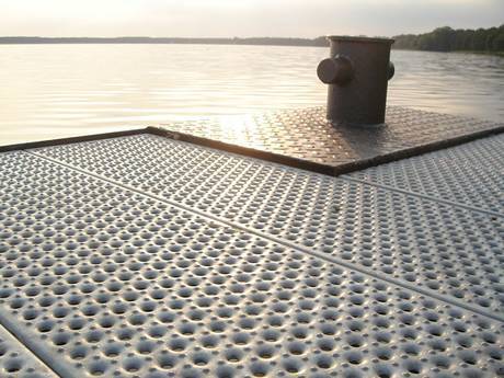 O-Grip safety grating is used as platform to prevent people from slipping beside the lake.