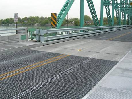 This a huge bridge with riveted grating bridge decking.