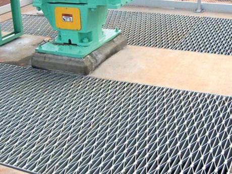 This is a operating platform with riveted grating.