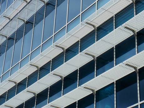 An office building with the steel bar grating sun Shade Panel.